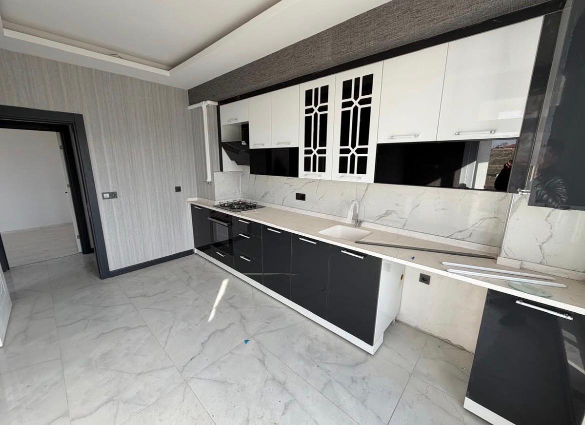 M.FEVZİ ÇAKMAK MAHALLESİNDE ARA KAT SİTE İÇİNDE SATILIK DAİRE 15