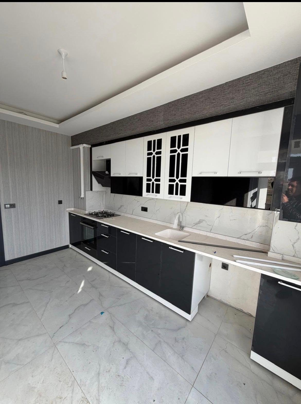 M.FEVZİ ÇAKMAK MAHALLESİNDE ARA KAT SİTE İÇİNDE SATILIK DAİRE 16