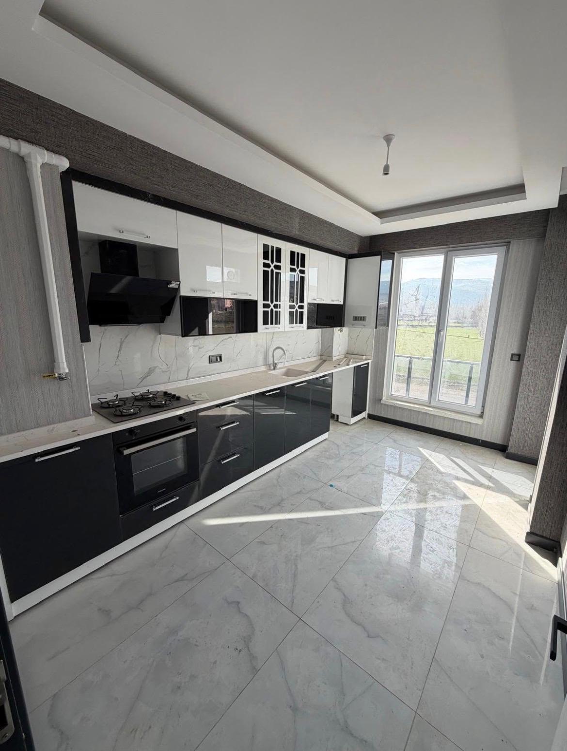 M.FEVZİ ÇAKMAK MAHALLESİNDE ARA KAT SİTE İÇİNDE SATILIK DAİRE 23