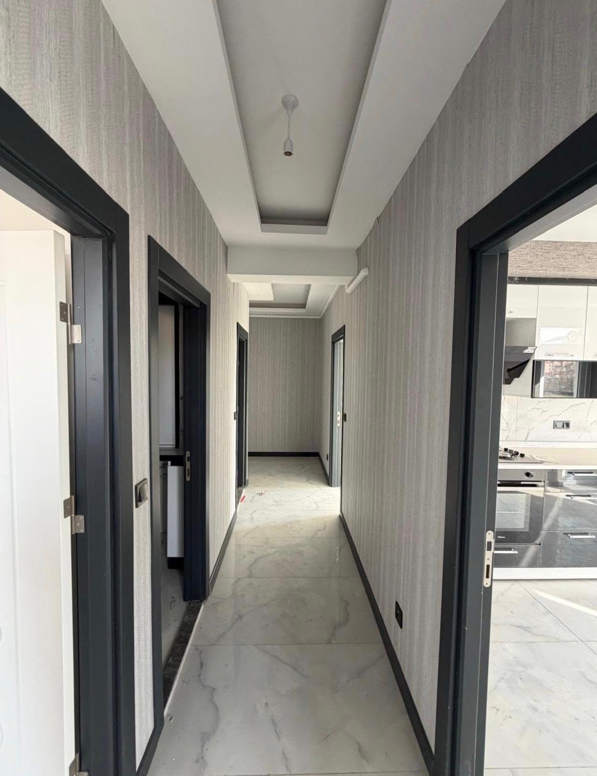 M.FEVZİ ÇAKMAK MAHALLESİNDE ARA KAT SİTE İÇİNDE SATILIK DAİRE 27