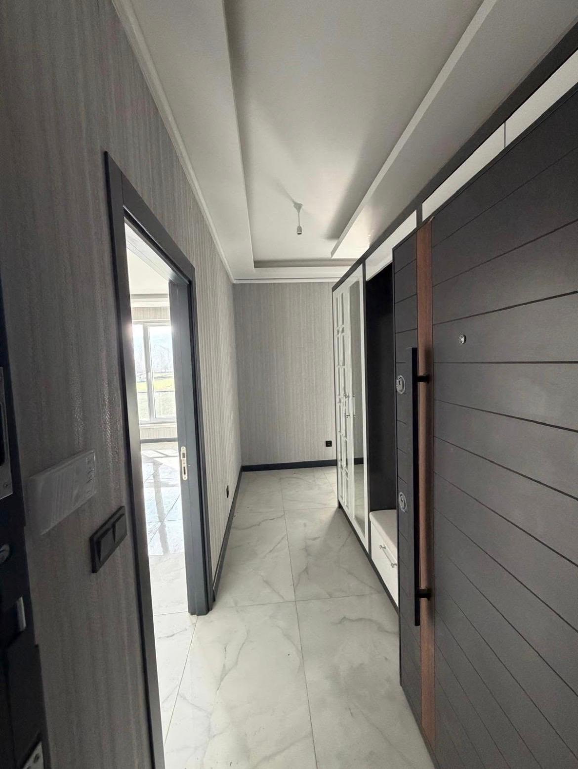 M.FEVZİ ÇAKMAK MAHALLESİNDE ARA KAT SİTE İÇİNDE SATILIK DAİRE 34