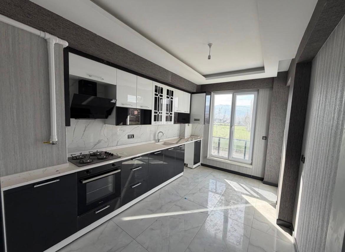 M.FEVZİ ÇAKMAK MAHALLESİNDE ARA KAT SİTE İÇİNDE SATILIK DAİRE 39